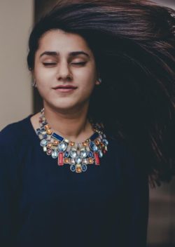close-up-young-woman-tossing-hair_1048944-13899720
