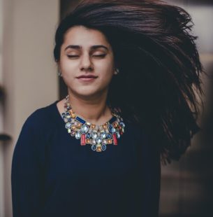 close-up-young-woman-tossing-hair_1048944-13899720